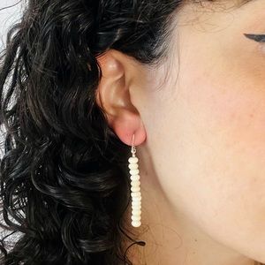 Beige stacked beaded dangle earrings